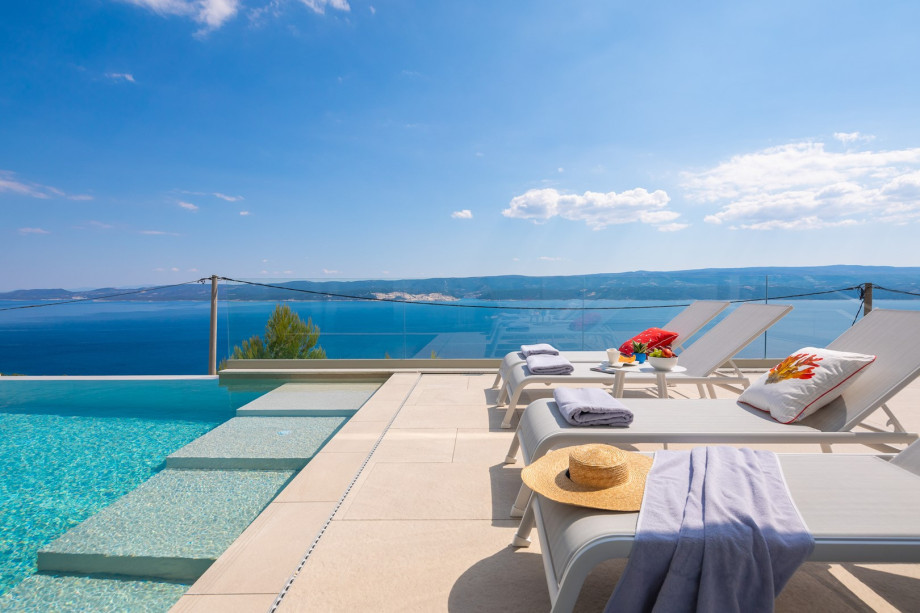 pool area with panoramic views of the island and sea
