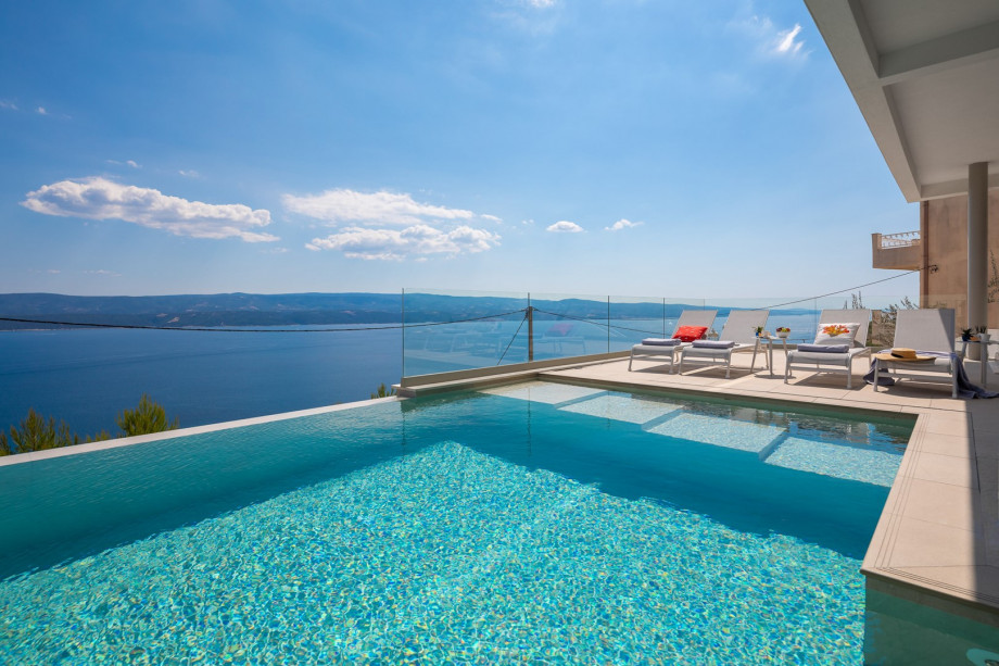 pool area with panoramic views of the island and sea
