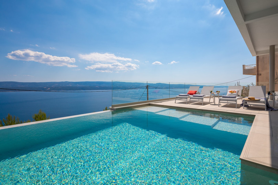 pool area with panoramic views of the island and sea