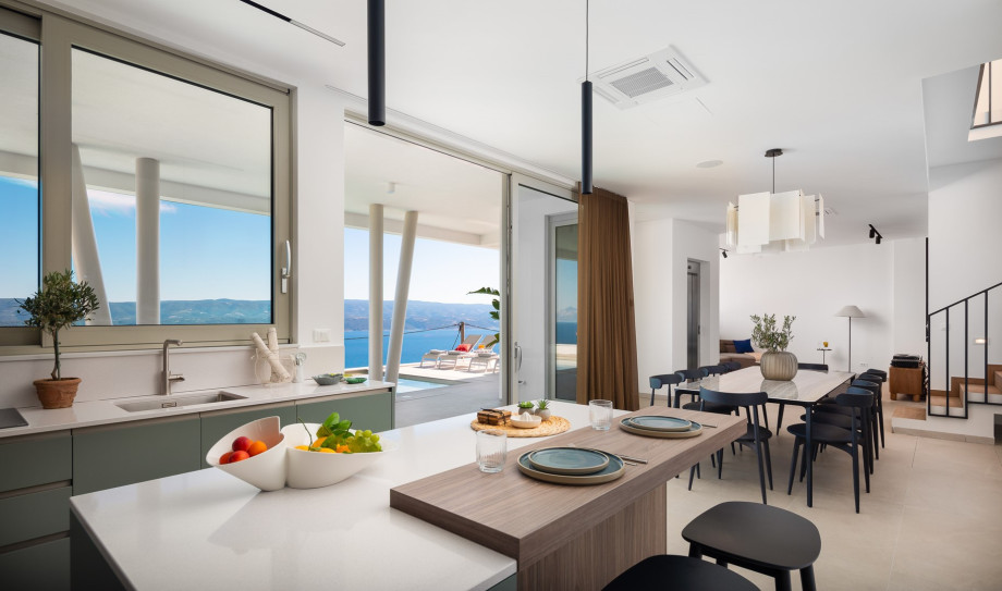 a modern open concept kitchen and living room