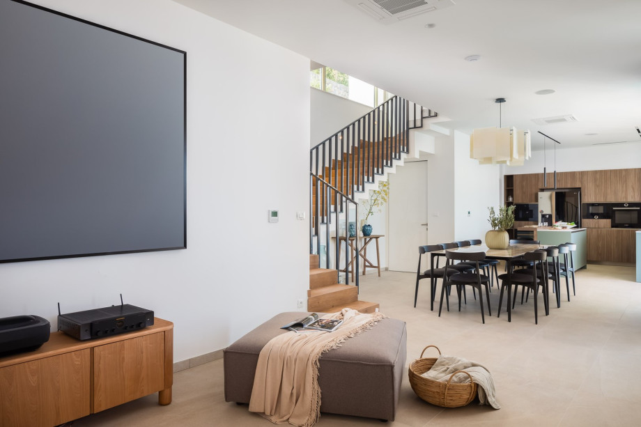 a modern open concept kitchen and living room