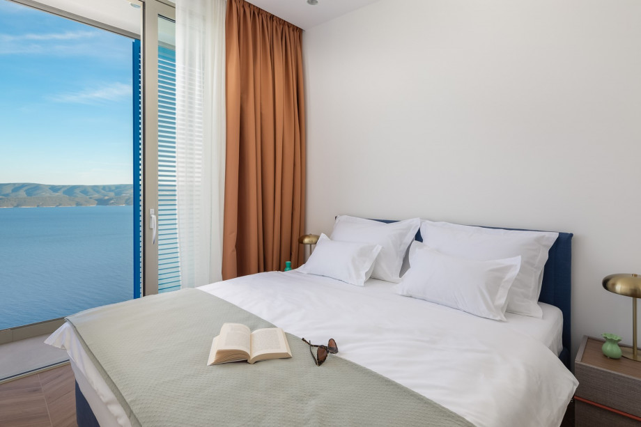 Bedroom NO3 (10 sqm) a king-size bed, a TV, an attached bathroom with a shower, and a balcony.