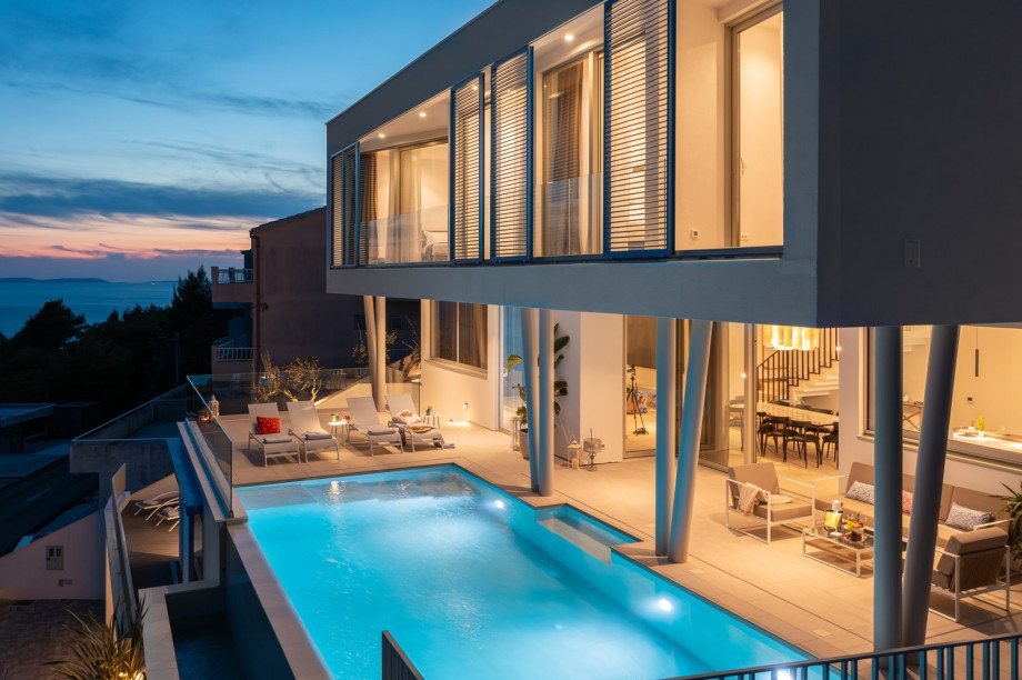 sun deck area (29sqm) with eight deck chairs, a lounge corner, and an outdoor shower