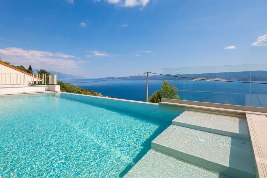 pool area with panoramic views of the island and sea