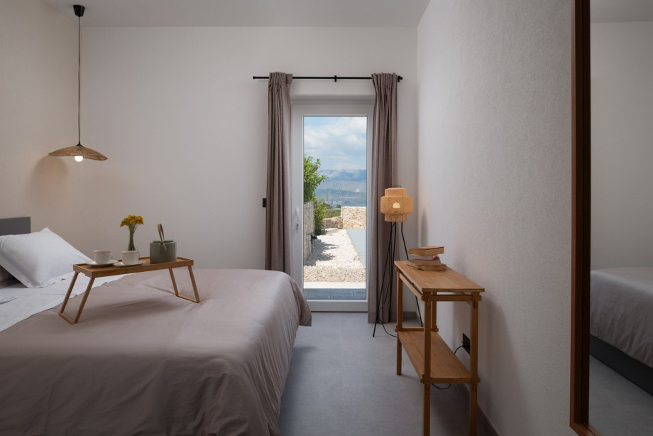 Air-conditioning, en-suite bathroom with a shower, and a direct approach to the pool area.