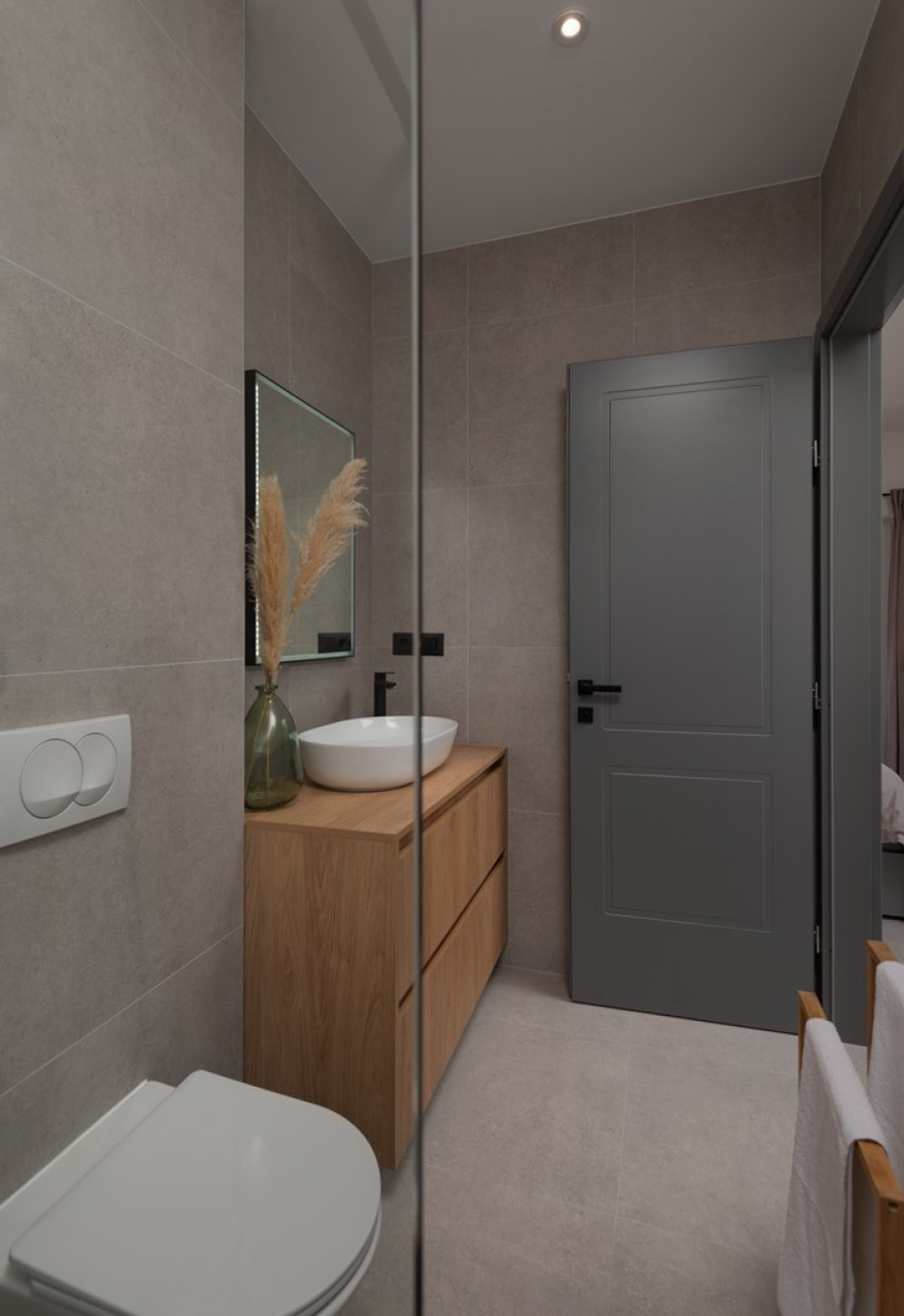 En-suite bathroom with a shower.
