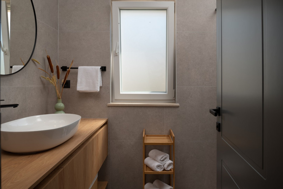 A Family bathroom with a shower next door from bedroom NO3.
