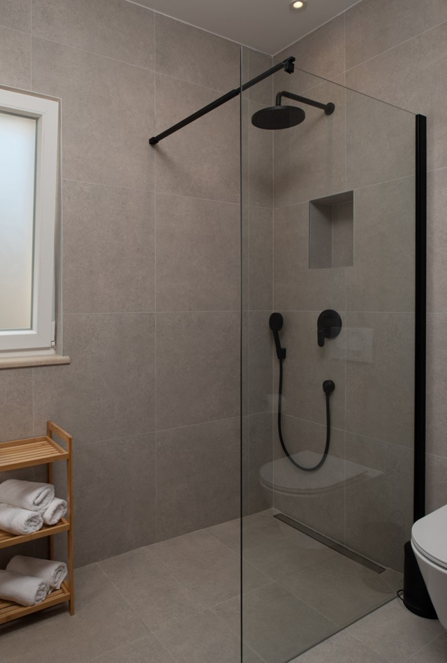 Family bathroom with a shower
