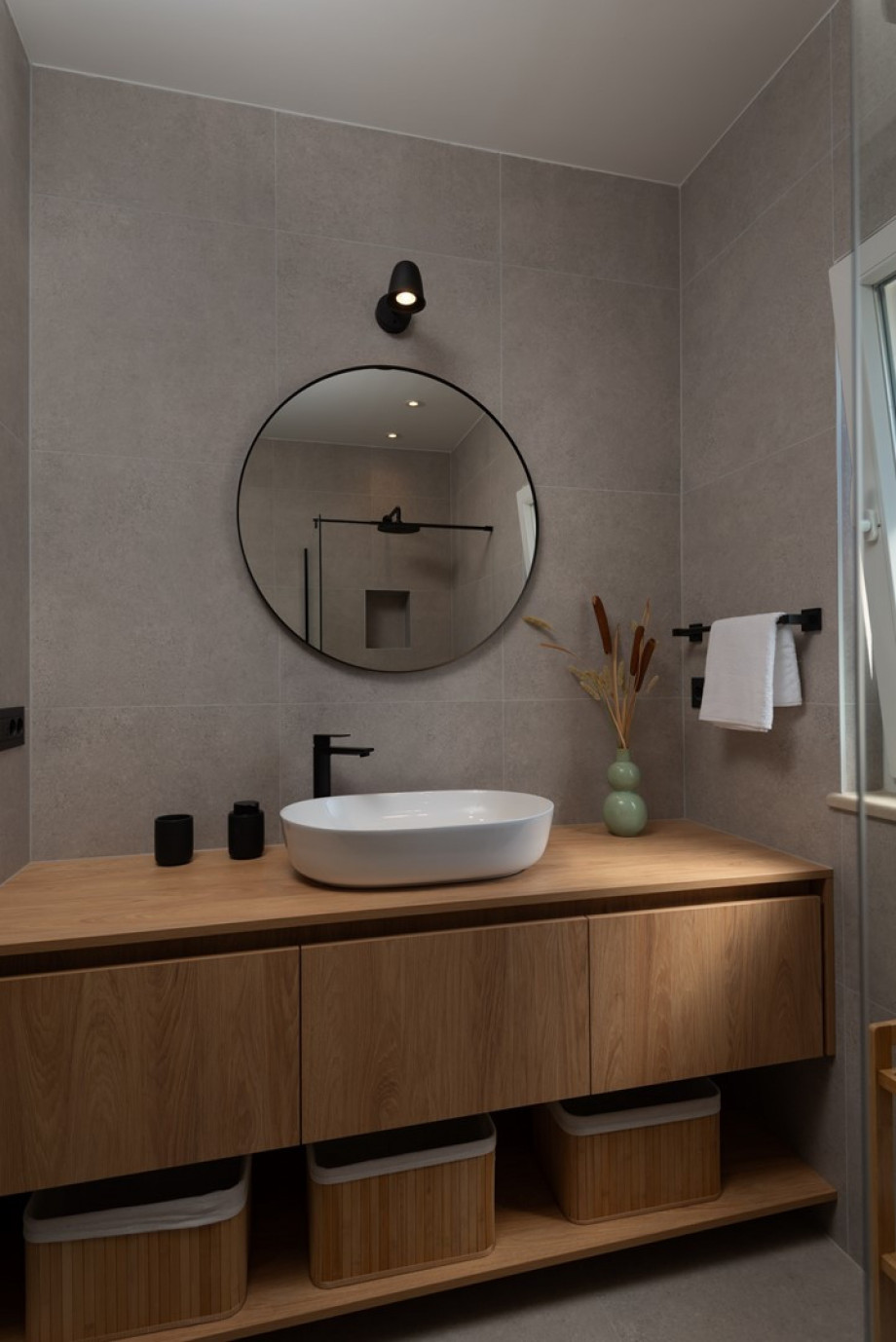 There is also a washing machine, a dryer, and ironing amenities for your use.