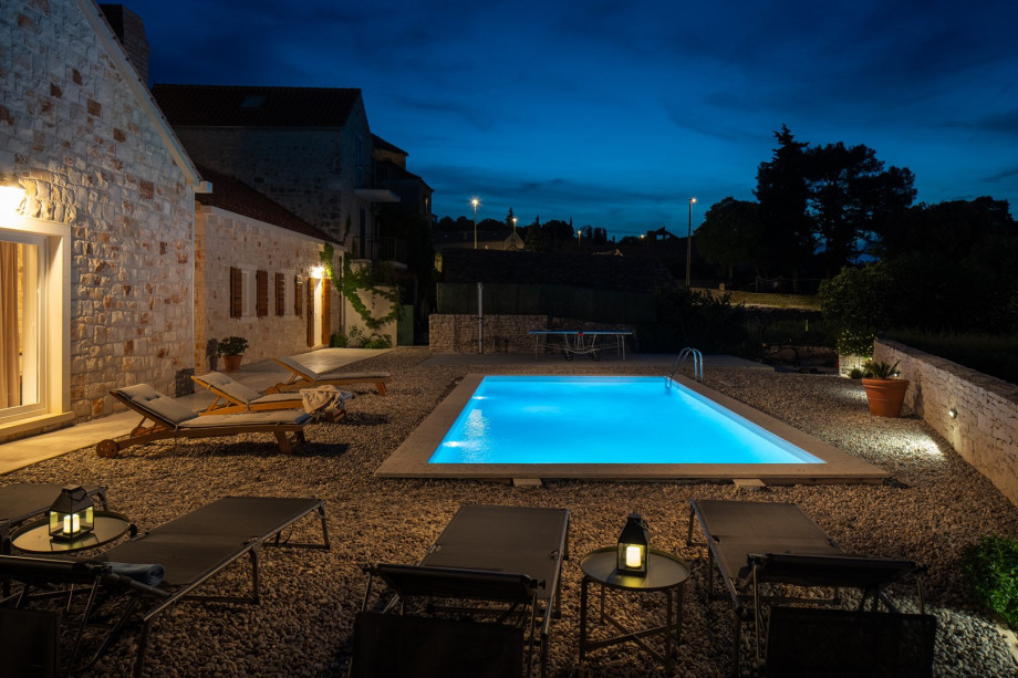 3 bedrooms, 3 bathrooms, a pebbled area with some toys for your youngest