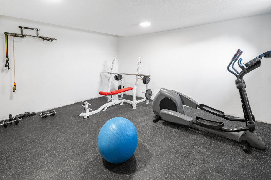 This beautiful villa has a spacious gym with several machines
