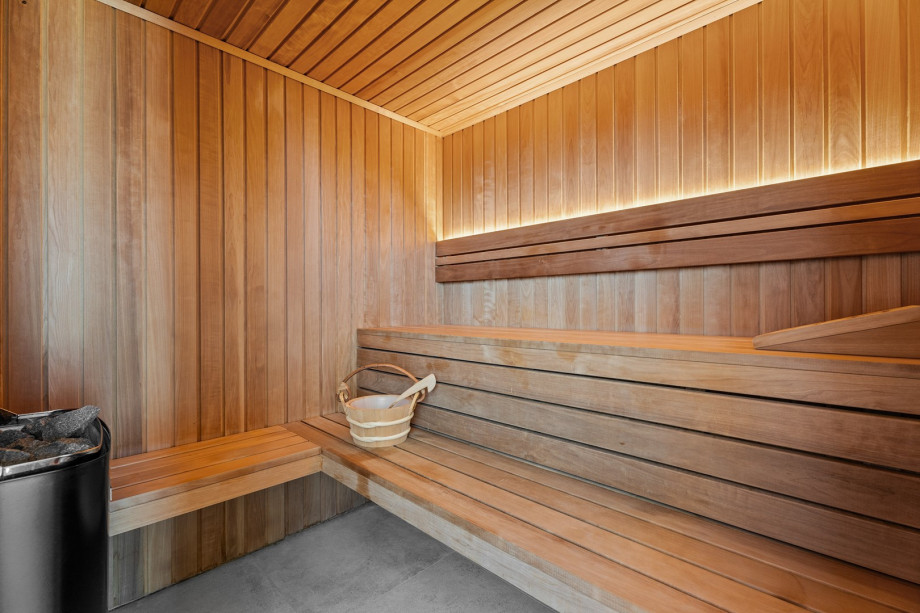 The spa area with a sauna and jacuzzi is the perfect spot for a relaxing