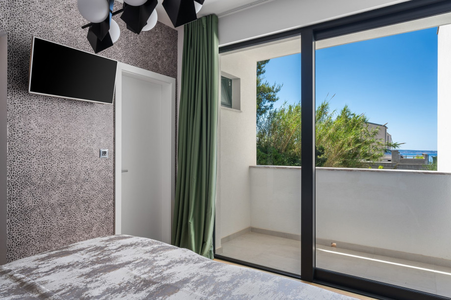 Bedroom No 3 (13sqm, South-East) with King size bed 180cm x 200cm, TV, A/C and en-suite Bathroom with shower