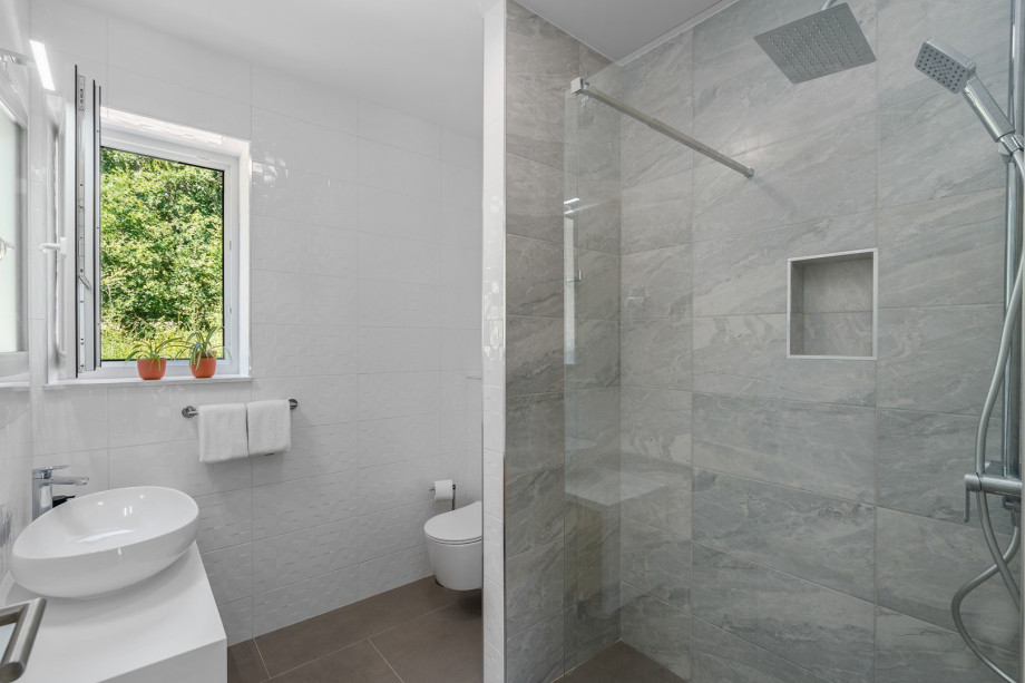 A family bathroom NO1 (5sqm) with a shower.