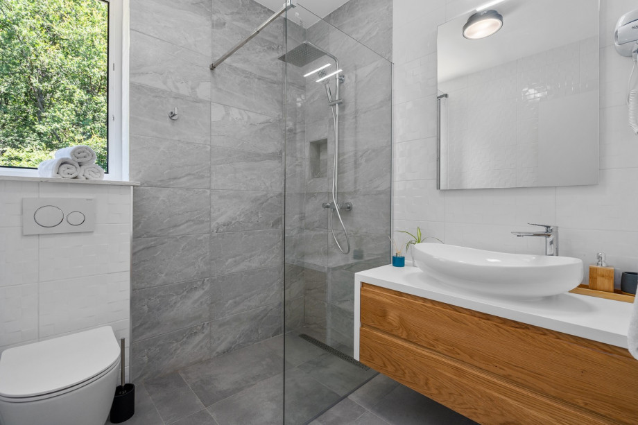 A Family Bathroom NO3 (5sqm) with a shower.