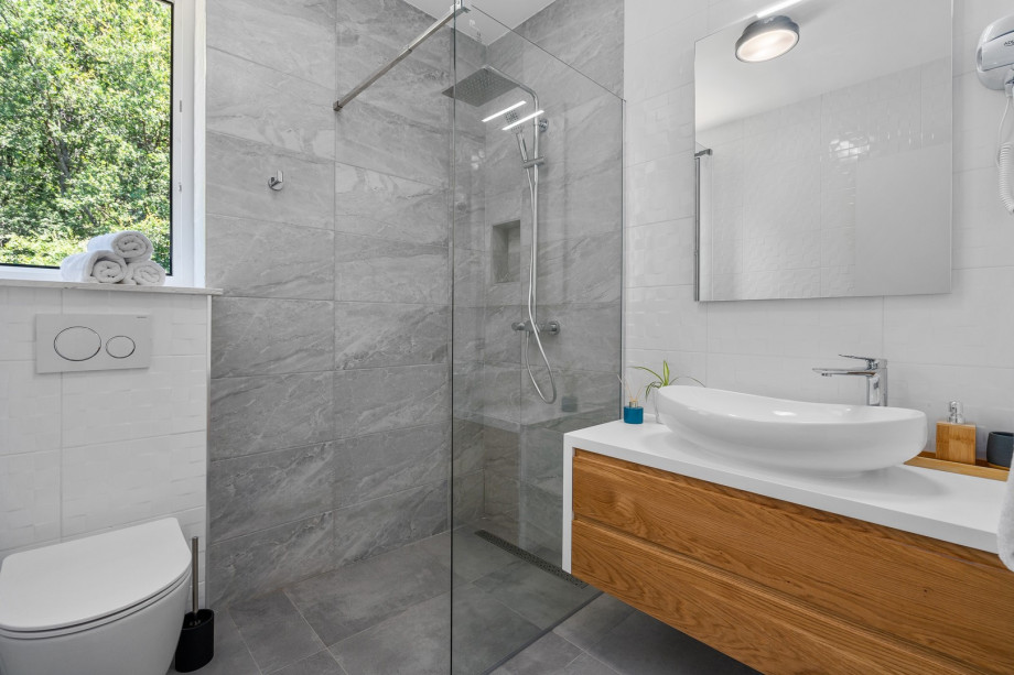 A Family Bathroom NO3 (5sqm) with a shower.