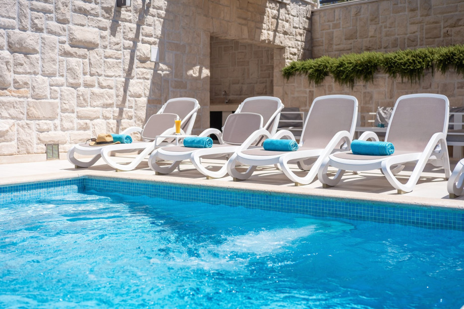 The villa’s expansive sun deck is perfect for soaking up the sun