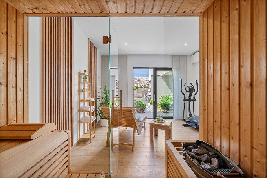 This space features a tradditional Finnish sauna, a versatile workout machine and an orbitrack