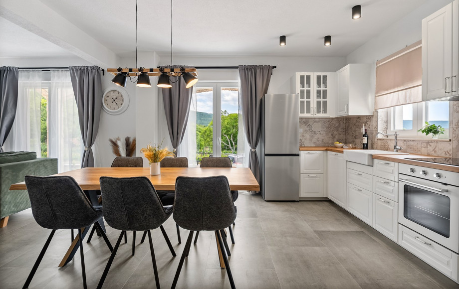 A fully equipped kitchen with all modern appliances (dishwasher, oven, microwave, kettle,  toaster)