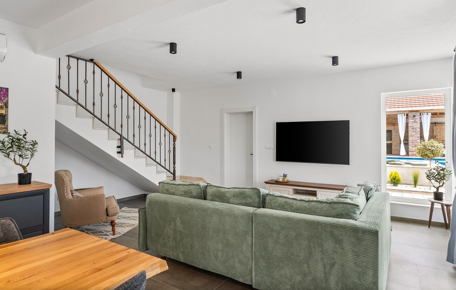 The villa’s interior is stylish, warm, and practical – designed to make you feel right at home from the moment you arrive