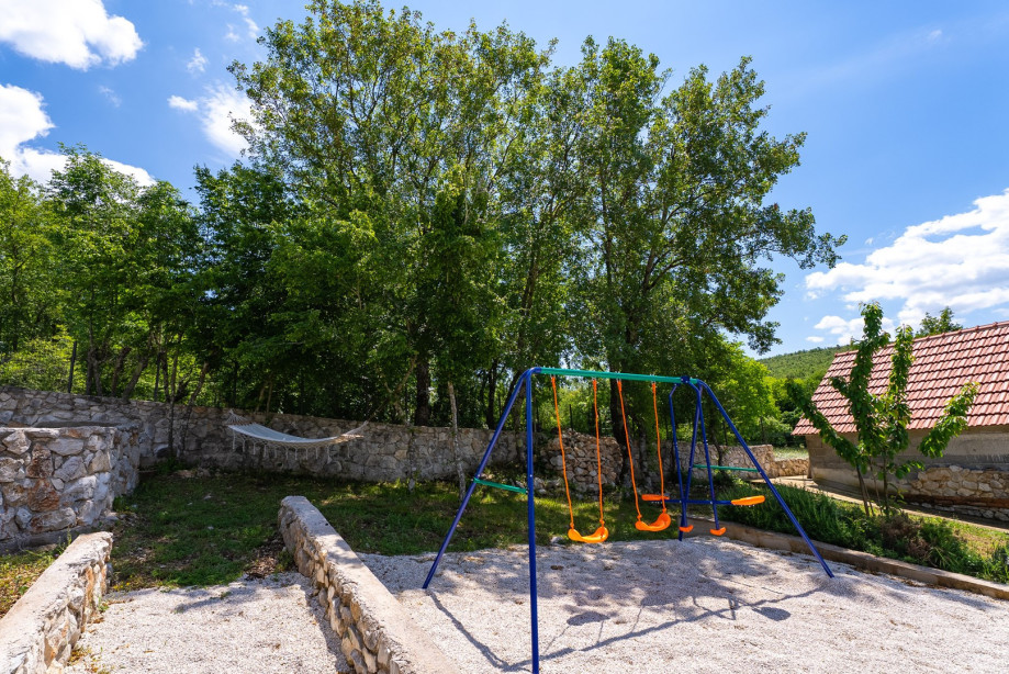 A slide and seesaw for the little ones