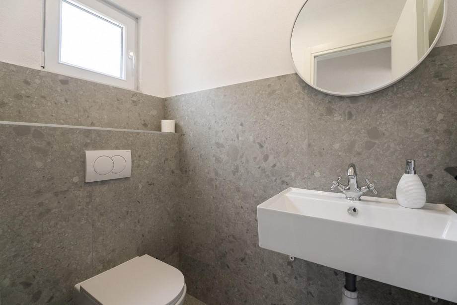 An outdoor shower and a separate toilet for your convenience