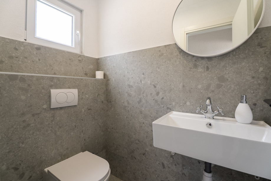 An outdoor shower and a separate toilet for your convenience