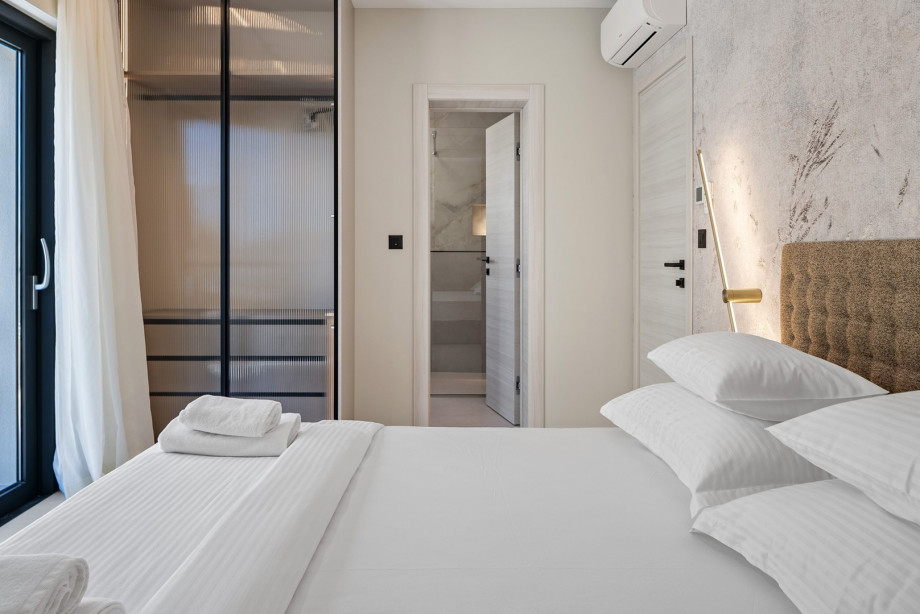 Bedroom No.1 with separate shower bathroom (6sqm), and a garden exit