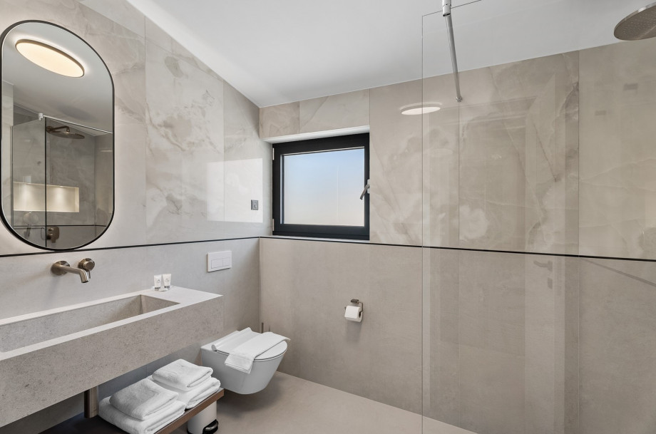 Private bathroom with a shower