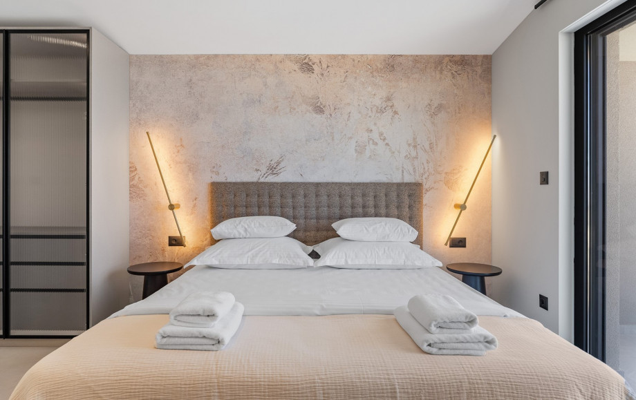 Bedroom No. 3 with a queen-size bed 160 cm by 200 cm, TV, A/C