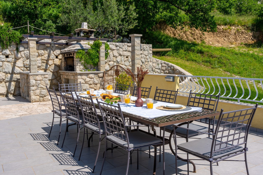 Spacious traditional barbecue and dining area