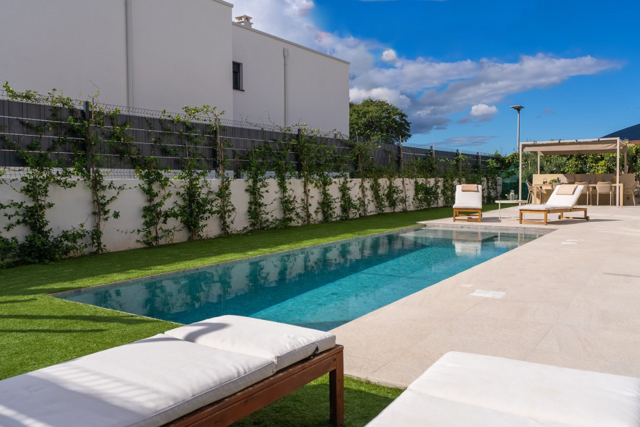 The outdoor area features a private 9 x 3 m heated swimming pool