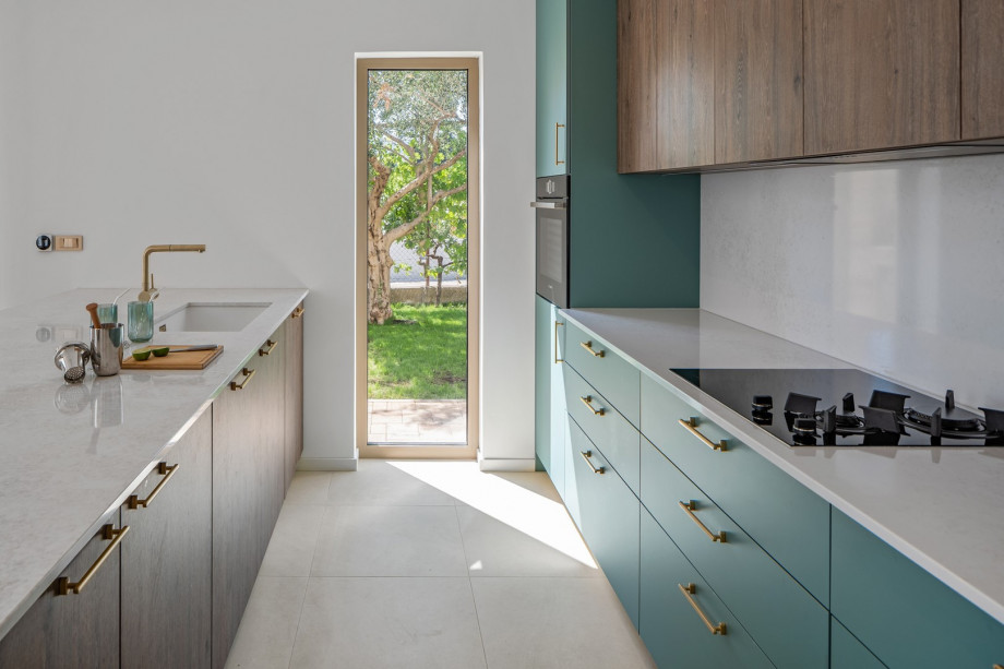 A fully equipped kitchen with all the needed amenities a modern guest needs for a comfortable stay