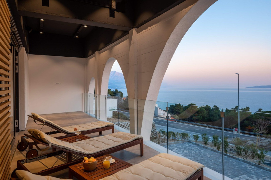 Additionally, there is a 28sqm loggia with 4 deck chairs and 2 deck chairs inside for relaxing.