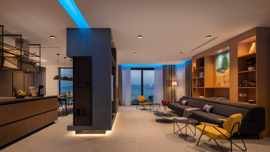 This level offers a living/dining/sleeping area together with a pool area.