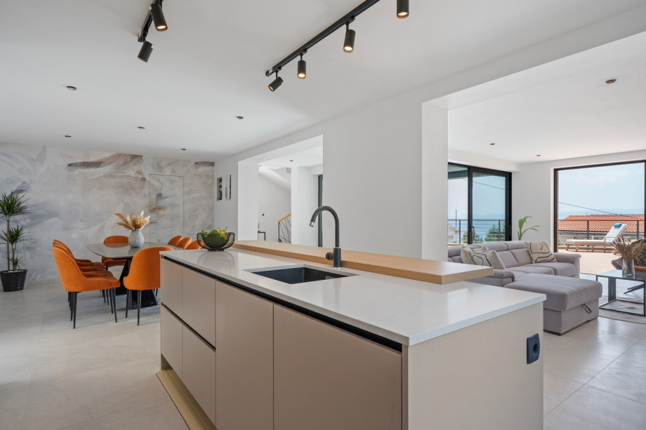 A fully equipped kitchen with a kitchen island