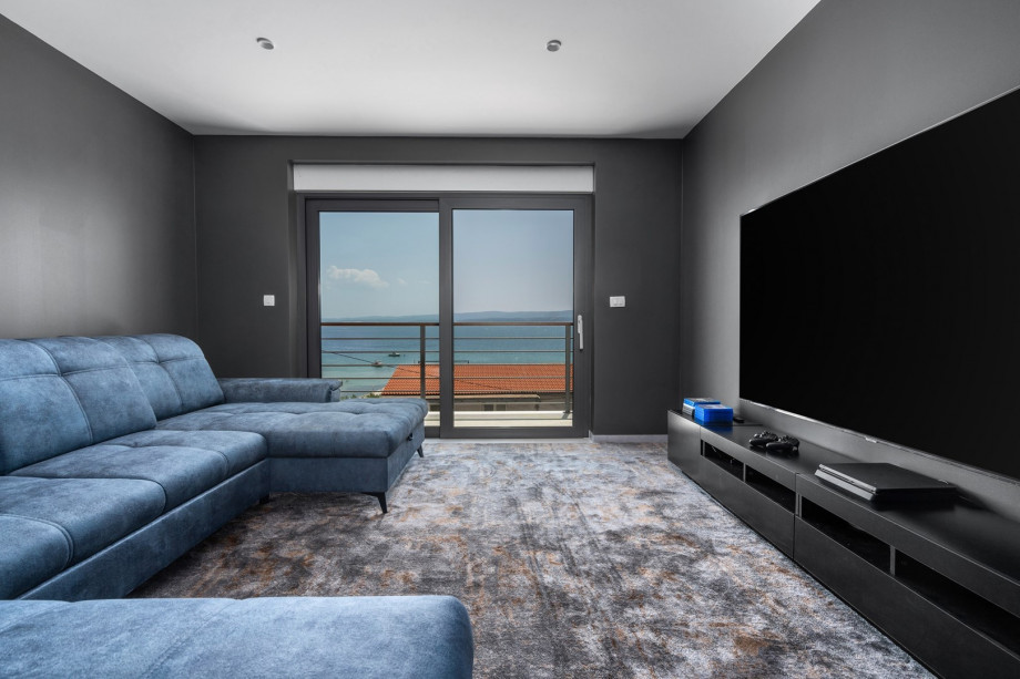 Media room (17 sqm) with a sofa (can convert into a sofa bed for 2)