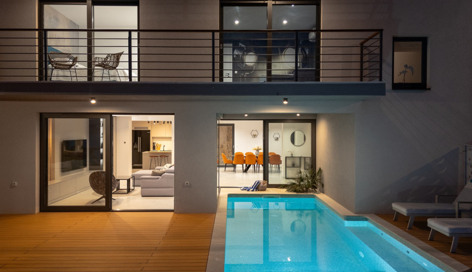 A stylish decking around the pool.