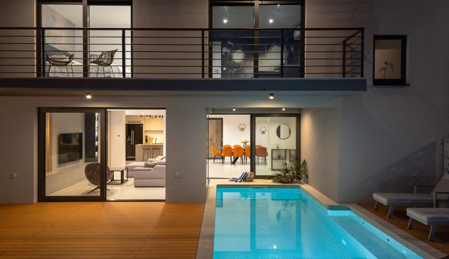 A stylish decking around the pool.