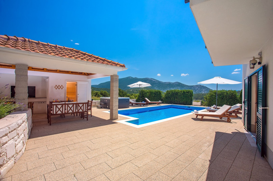 Spacious terrace with lounge and dining area