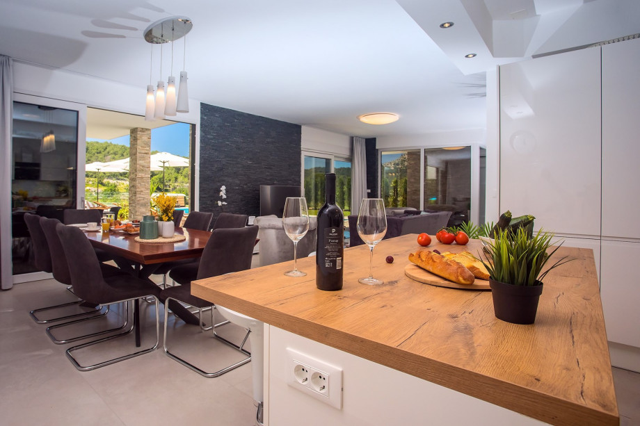 Spacious fully equipped kitchen with a dining area suitable for 8 people