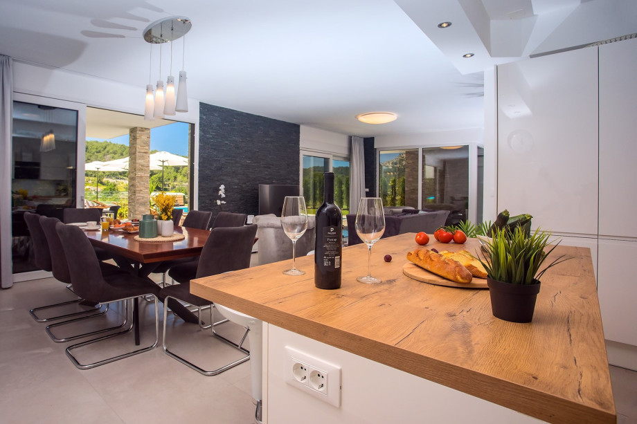 Spacious fully equipped kitchen with a dining area suitable for 8 people