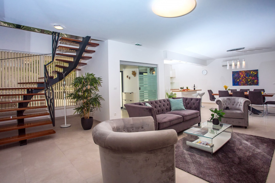 Internal steps take you to the first floor that offers a sauna room with fitness