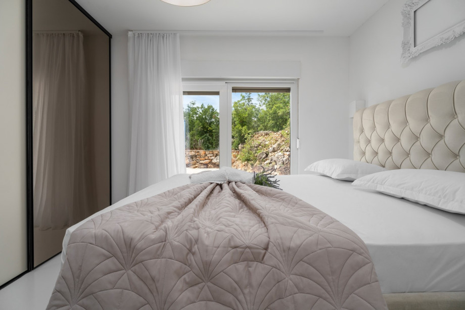 An exit toward the playground and the pool area.