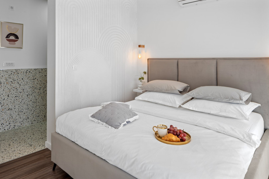 Bedroom No3. with a king size bed and shared balcony