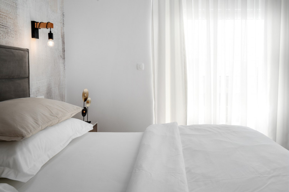 Bedroom No4 with TV, AC, en-suite bathroom, shared balcony.