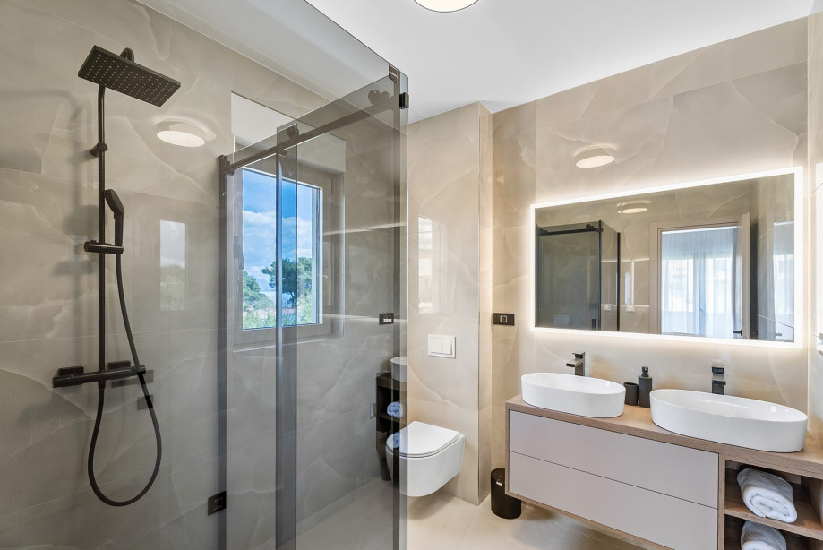 An en-suite bathroom with a shower