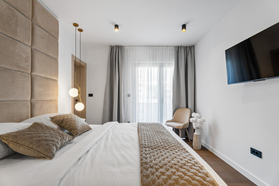 Nestled just 20 meters from the shimmering Adriatic Sea, this exquisite 6-bedroom villa offers a stylish accommodation for up to 12 guests