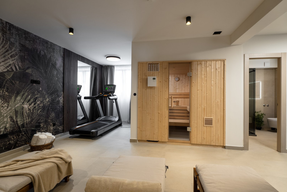 Private spa zone, which features a Finnish sauna, a well-equipped fitness area with treadmill