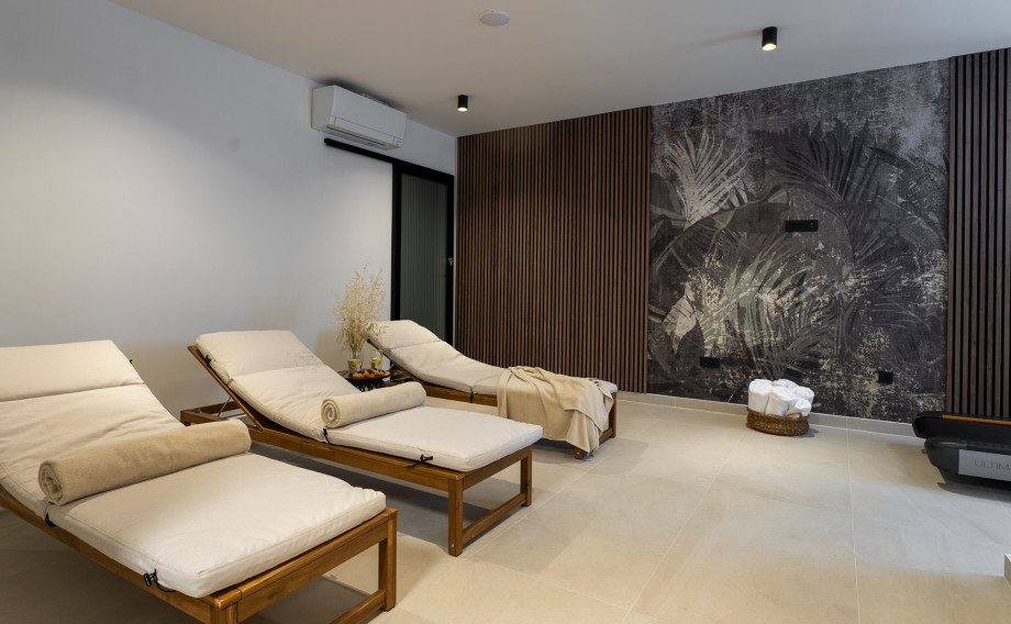 A a relaxing zone and a bathroom with a shower